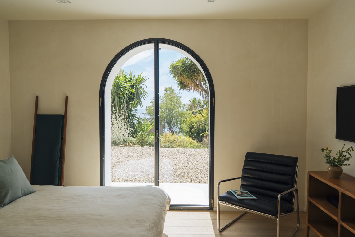 Bedroom with arched window