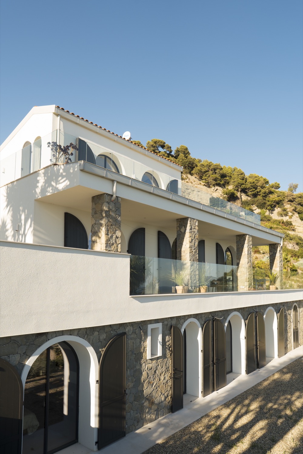 Villa Guglielmina three-storey facade with arched windows and stone columns