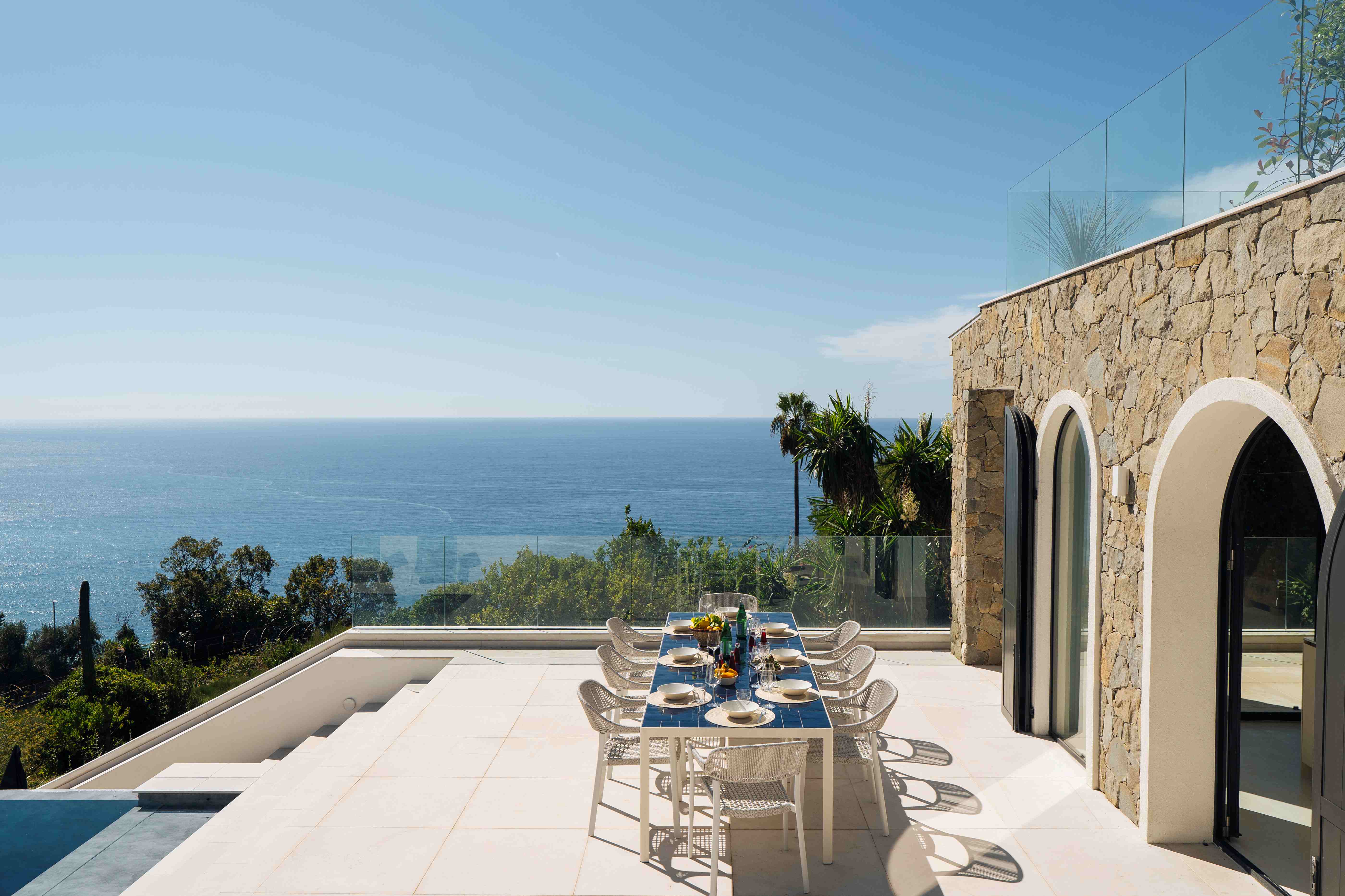 Terrace dining table with panoramic sea view